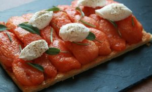 Starter confit tomato tart with goat cheese