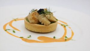grilled scallops with lobster sauce and crust pastry case and confit vegetable 
